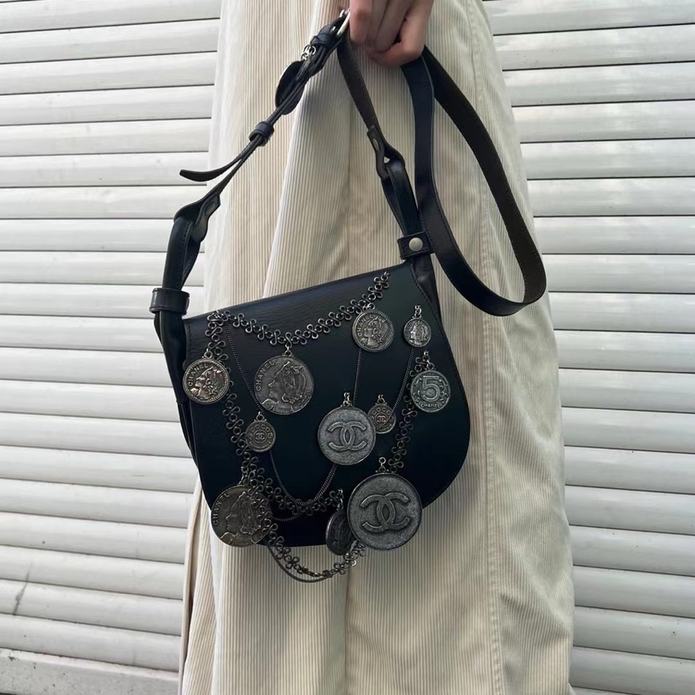 CHANEL Black Crossbody Bag with Coin Embellishments